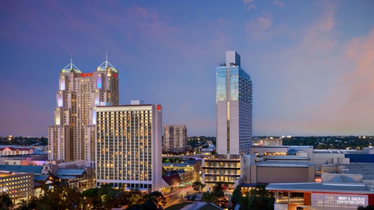 Outside night view of Marriott San Antonio Rivercenter.